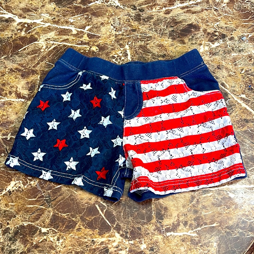American flag shorts. Size L girls. Great condition. Almost new.